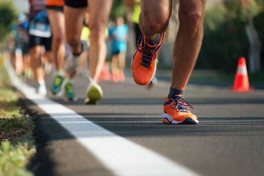  Group of runners participating in a road race