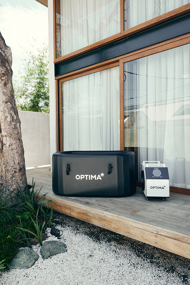 Optima nova system placed on a wooden deck outside a home.